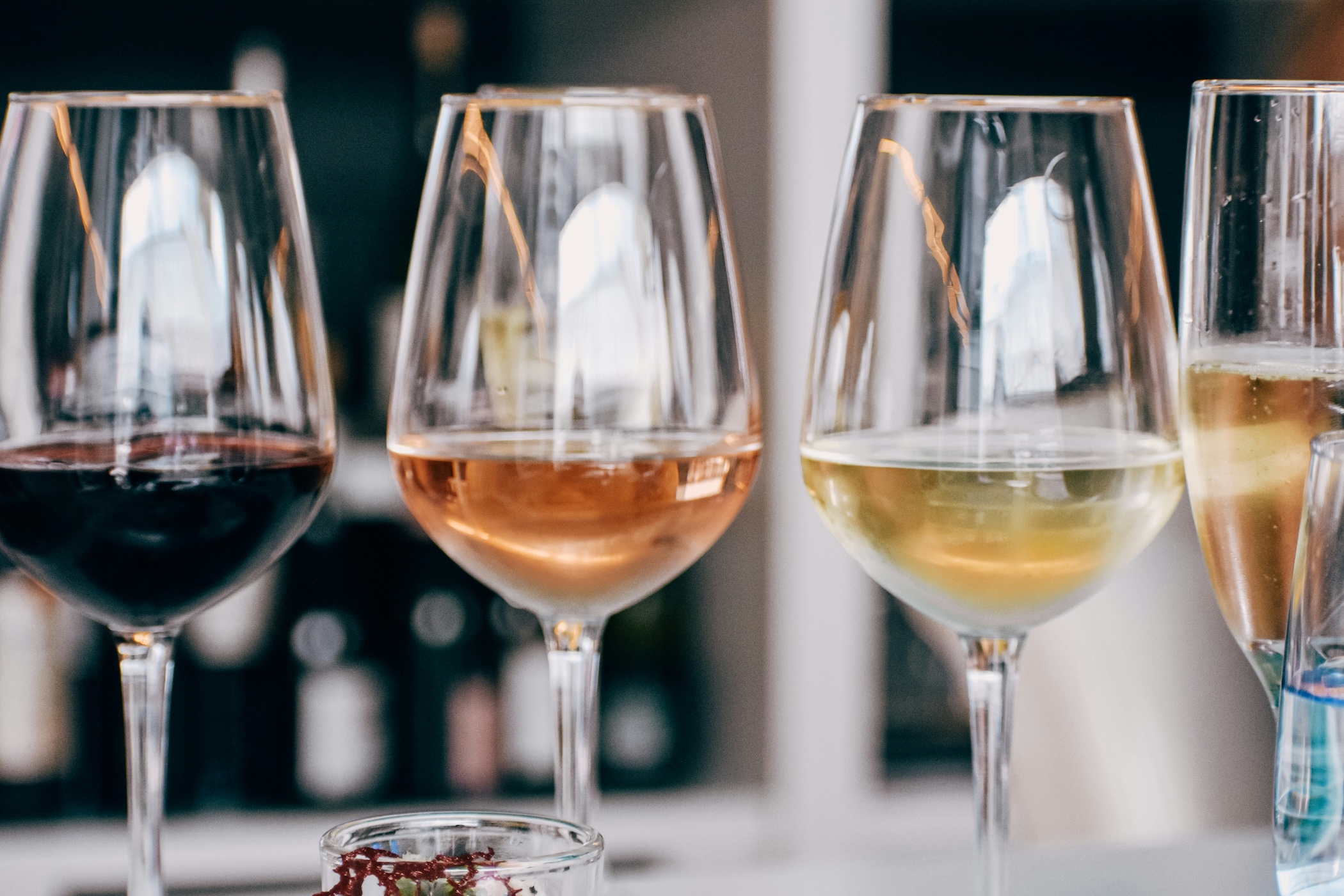 tasting wine glasses in a row